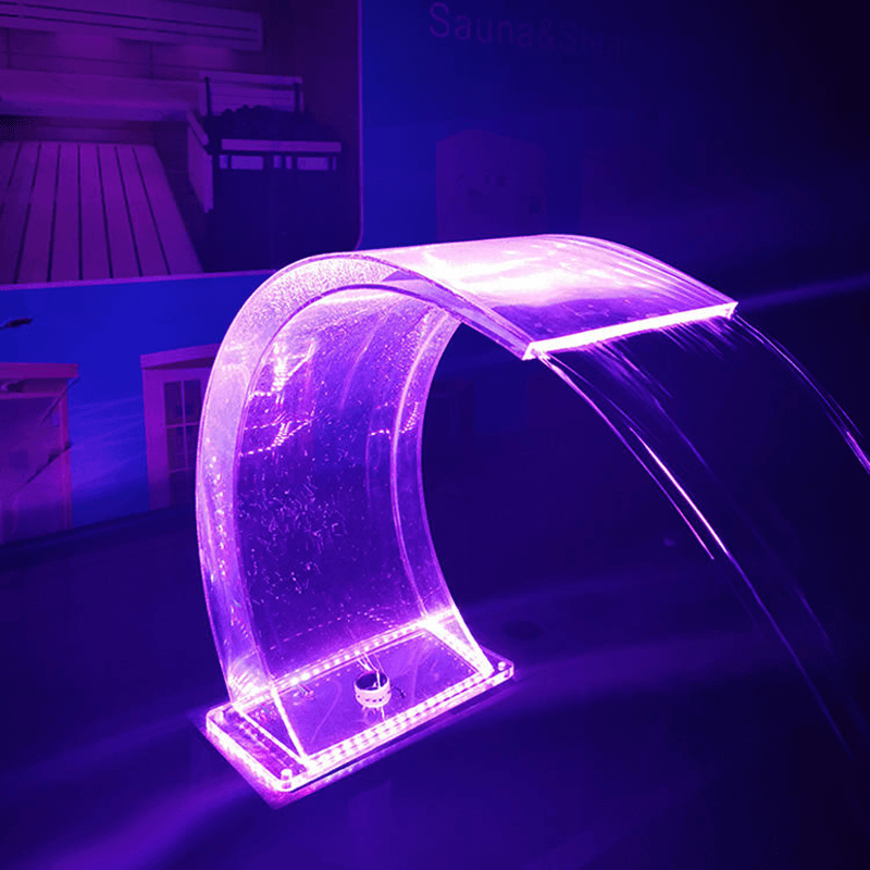 How Can Lighting Placement Improve an Acrylic Pool Waterfall?