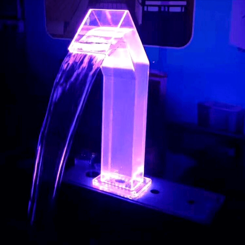 Acrylic pool waterfall lighting placement